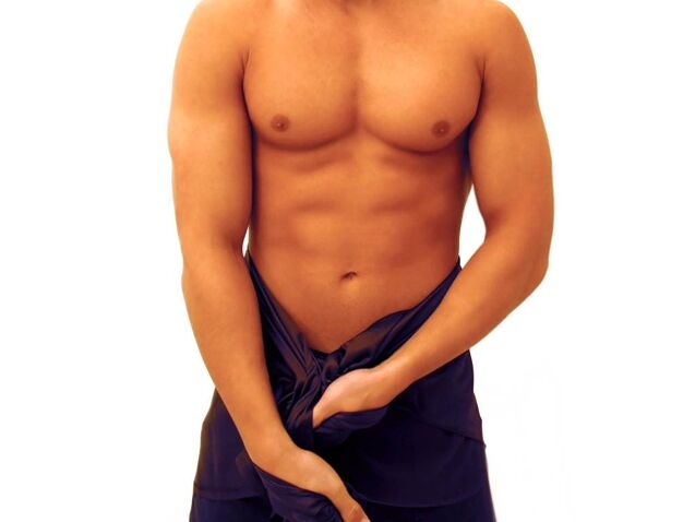 Een man voert oefeningen uit om zijn penis te vergroten